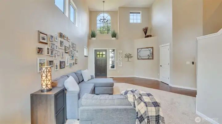 This cozy formal living space offers abundant natural light and an inviting open layout.