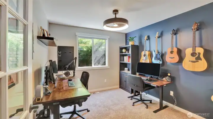 Enjoy this versatile flex space on the main floor - great for an office, home gym, playroom, or even guest room!