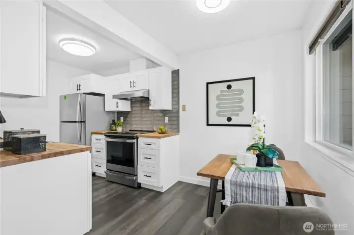 Dining open to kitchen