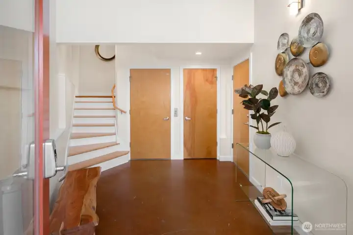 Entry level has elevator, hall closet and garage.