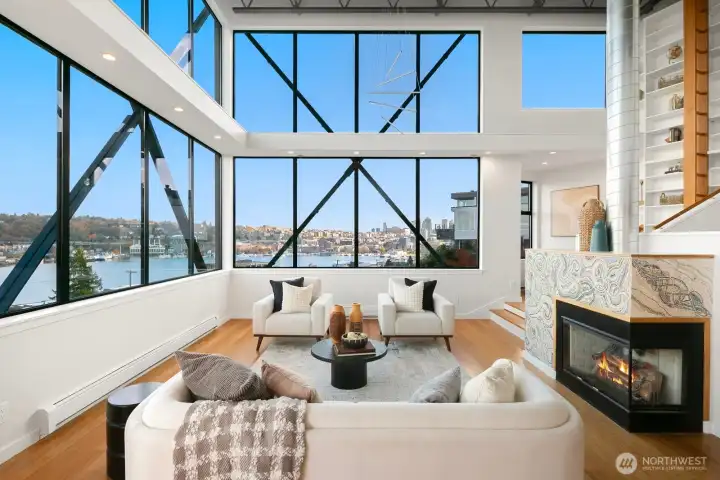 Living room with gas fire place and cInlerestory windows