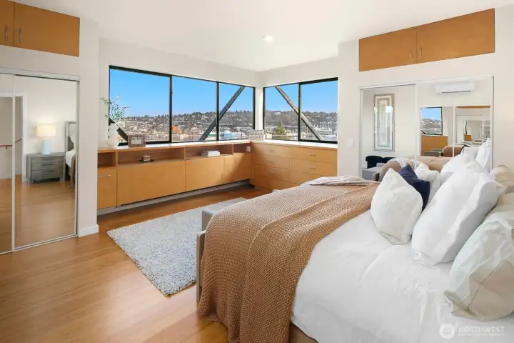 Primary bedroom has stunning views of the water and mountains