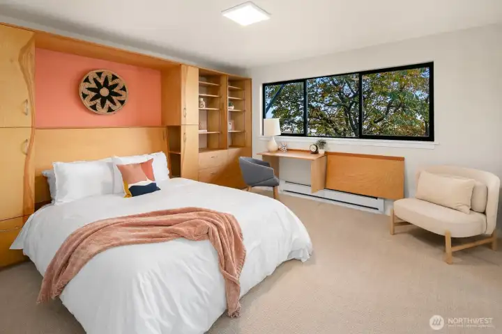 2nd bedroom has built in desks and murphy bed