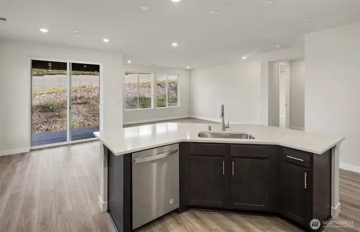 Kitchen finishes vary per home. Photo of same design, not this specific house.