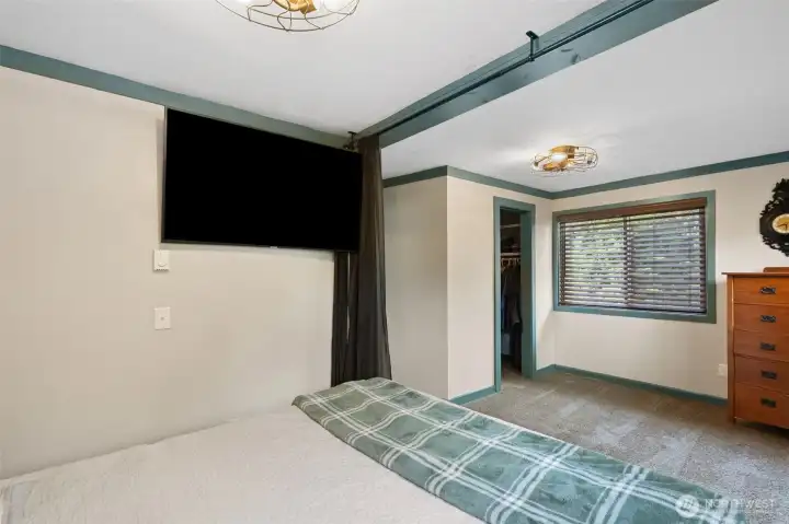Primary bedroom with walk in closet