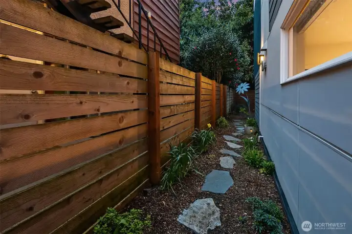 Side of home gardening area.