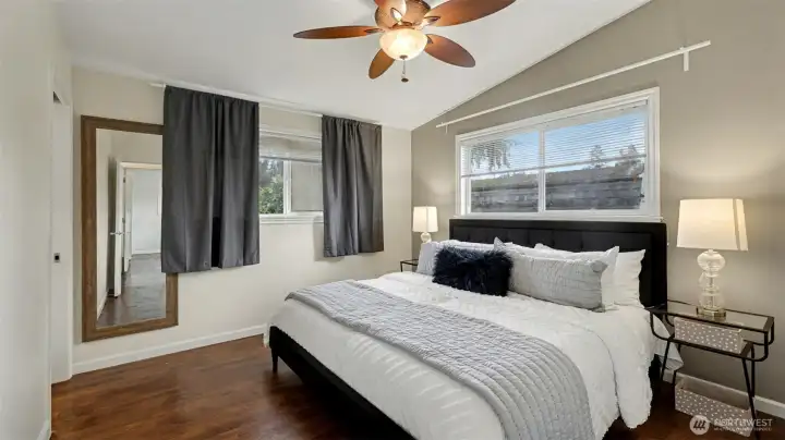 Upstairs primary bedroom with 3/4 bath