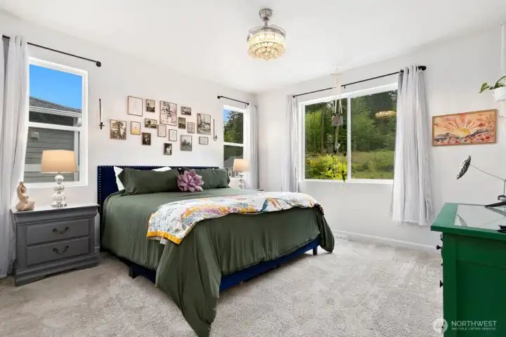 Generously sized primary suite with great views, fandelier, and attached primary bath and walk in closet! Generously sized primary suite with great views, fandelier, and attached primary bath and walk in closet!