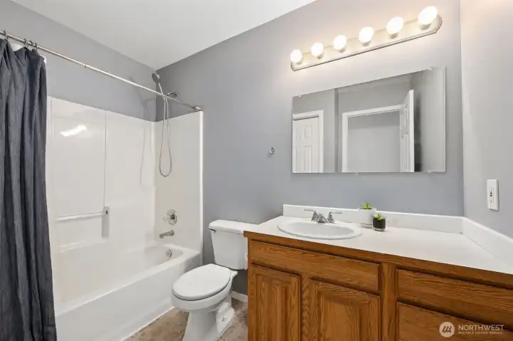 Main full bathroom- plus it has a linen closet! Main full bathroom- plus it has a linen closet!