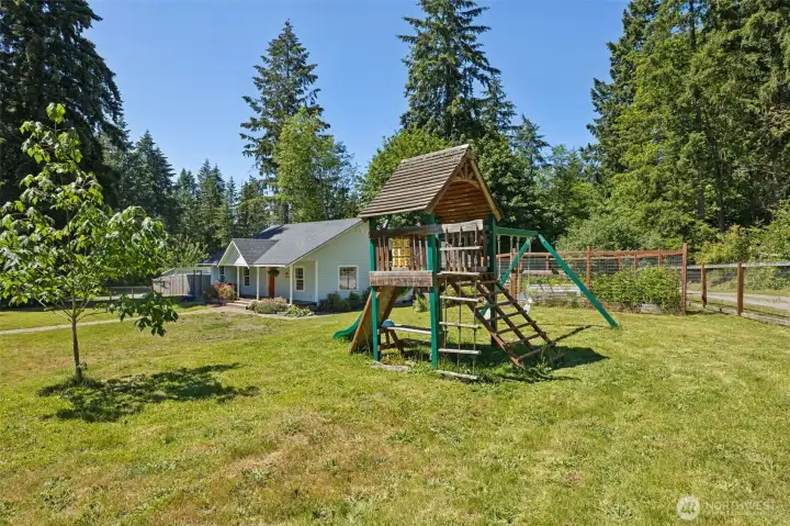 Fruit trees, garden space, and plenty of space to play- playset STAYS! Fruit trees, garden space, and plenty of space to play- playset STAYS!
