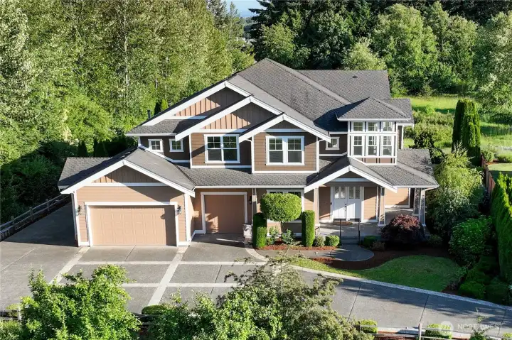 Welcome to this stately home in the desirable Alder Meadows neighborhood.
