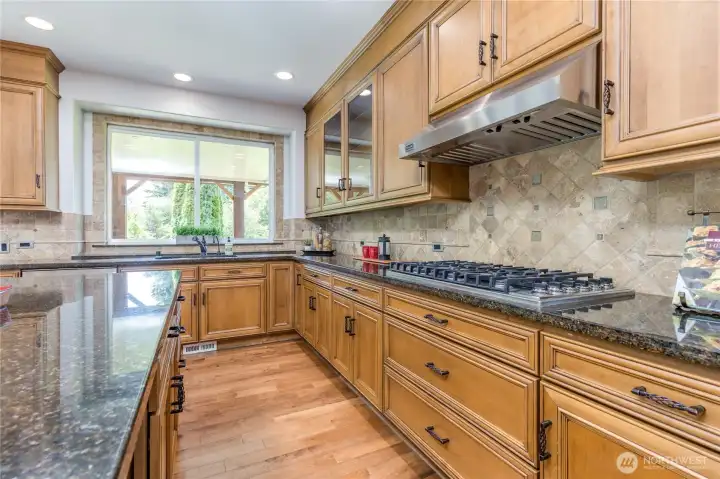 A gourmet cook's dream featuring a high-performance 6-burner Viking gas range.
