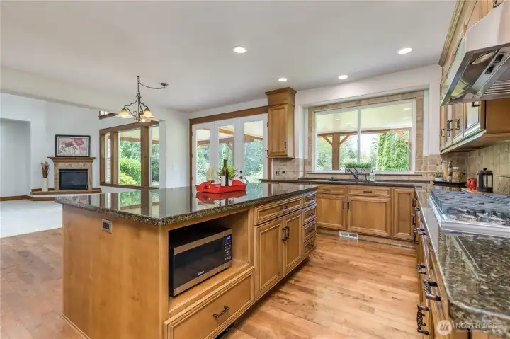 Designed for connection: The open-concept kitchen flows effortlessly into the family room, perfect for hosting and everyday living.