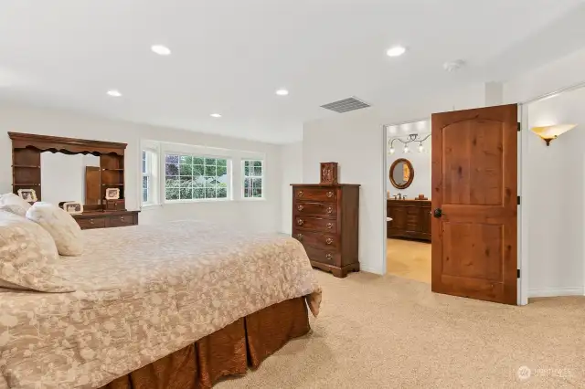 Large bay window brings in an abundance of natural light.  It's the perfect space for a reading nook, vanity, or a small nursery area.