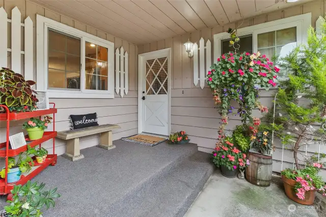 Charming covered porch welcomes you in to this spacious well laid out home.