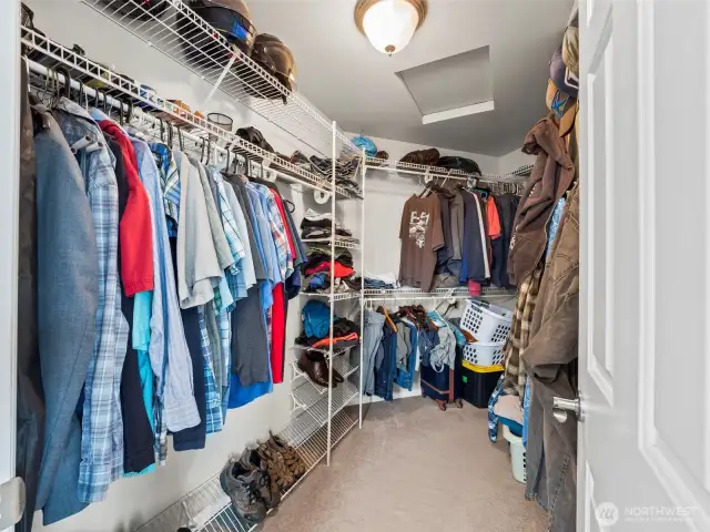 Walk-in closet in primary bathroom