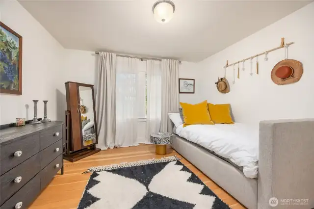 Third bedroom upstairs with nice picture window is very bright.