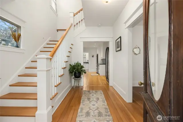 Bright and lovely entry with period door.  Fir wood floors have been refinished throughout the home.