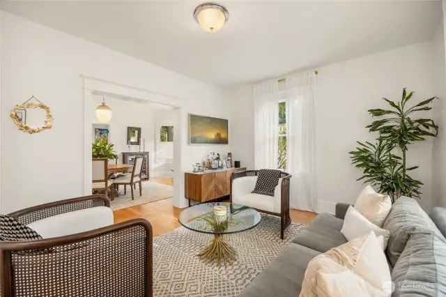 Period trim work in doorways and windows are showcased throughout this beautiful home.