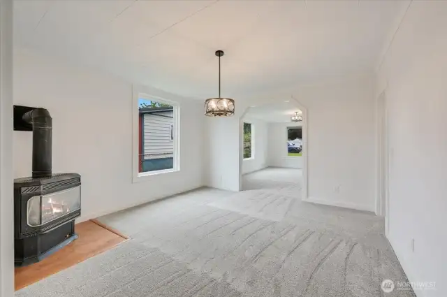 Dining Room with brand new carpet and gas fireplace