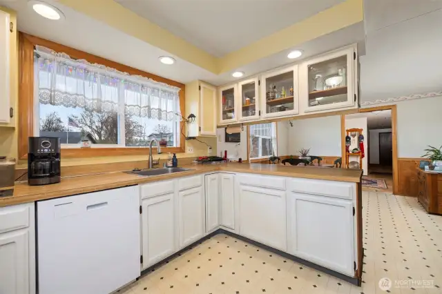 Main House Kitchen with ample storage and display cabinets for your treasures.