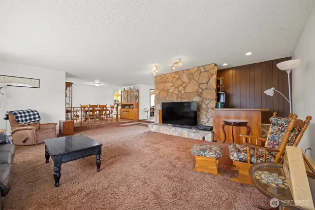 Main House: ?? Spacious living room w/ wood-burning fireplace & wet bar