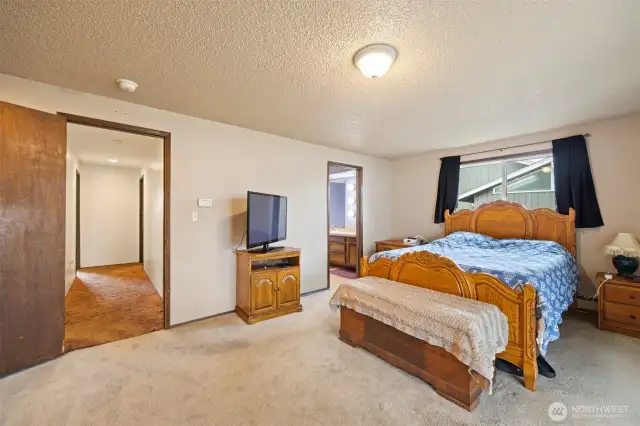 Main House:  Spacious Primary Bedroom with en suite