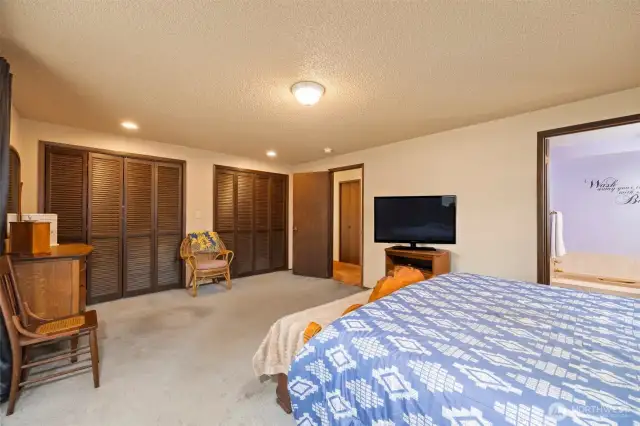 Main House:  Primary Suite offers large closets and entry to the outdoor patio