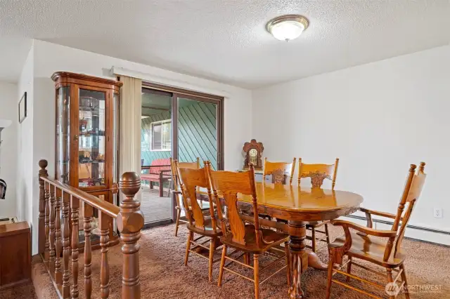 Main House: Formal dining room for special gatherings has entry point to outdoor living area