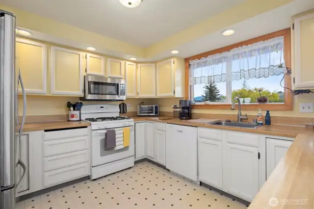 Main House: Kitchen with ample storage and work spaces.