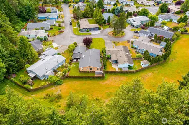 The home backs up against a greenbelt for maximum quiet & privacy.