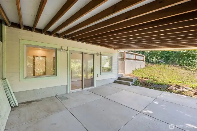 Patio below the deck w/lake views