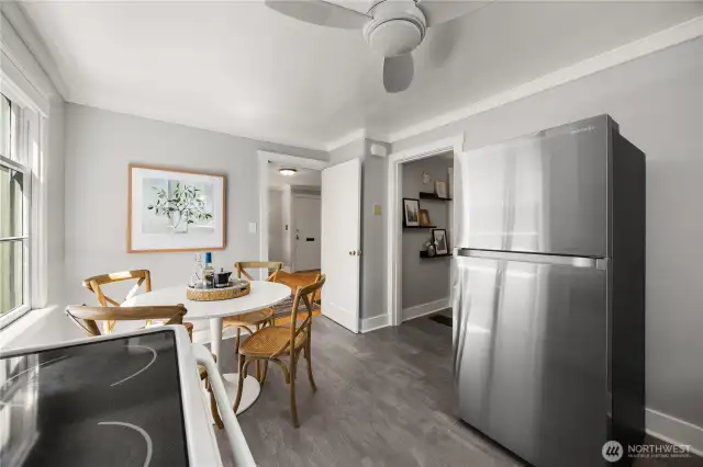 Kitchen has been refreshed with new flooring and paint.