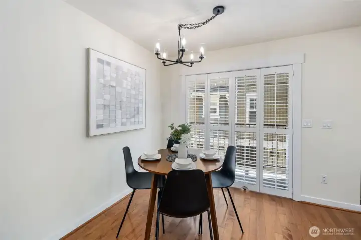 New light fixture can be adjusted to how you center your table and your ideal height.