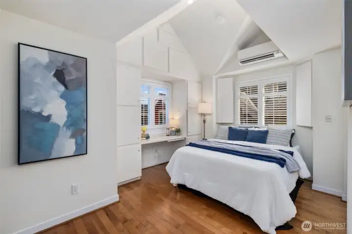 Upper level room can be a bedroom or fantastic home office. Plenty of closet space and custom built-in storage PLUS its own full bathroom.