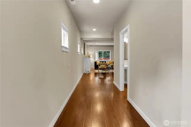 You are impressed by feel and layout of this beautiful home when you step into the entry area and walk through the main hallway.