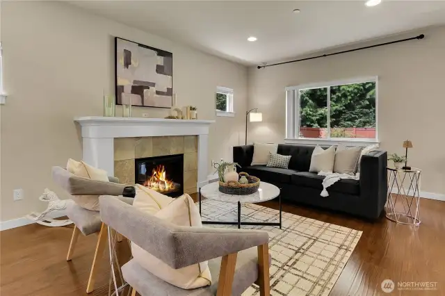 A cozy gas fireplace highlights the family room and adds ambiance to this comfortable room.