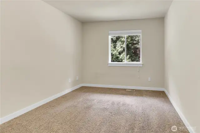 Bedroom four has a window overlooking the fully fenced backyard.