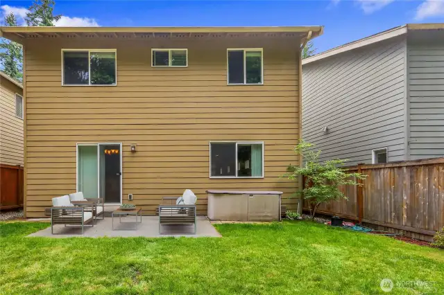 Situated on a nice lot that backs to a peaceful wooded area. Storage shed located on the north side of the home. Exterior lights on the front and the back of home that are programmable to go on & off at specific times of the day or night. (deck furniture is virtual staging)