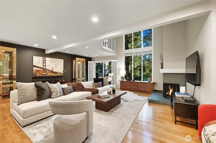Enter the stunning great room with vaulted ceilings and floor-to-ceiling windows!