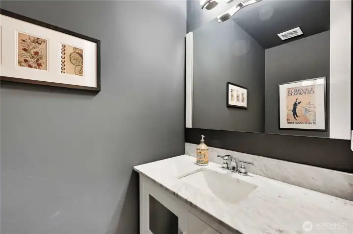 Lovely remodeled half-bath on the main level