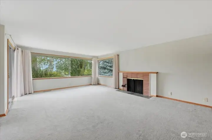 Enormous living room with fireplace.