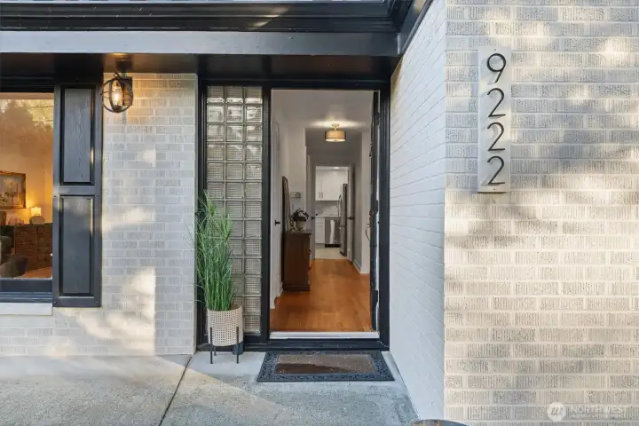 Front entrance with new exterior lighting