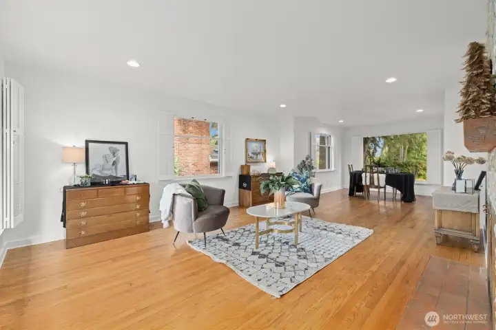 Living room just off of main entrance with original oak hardwood flooring