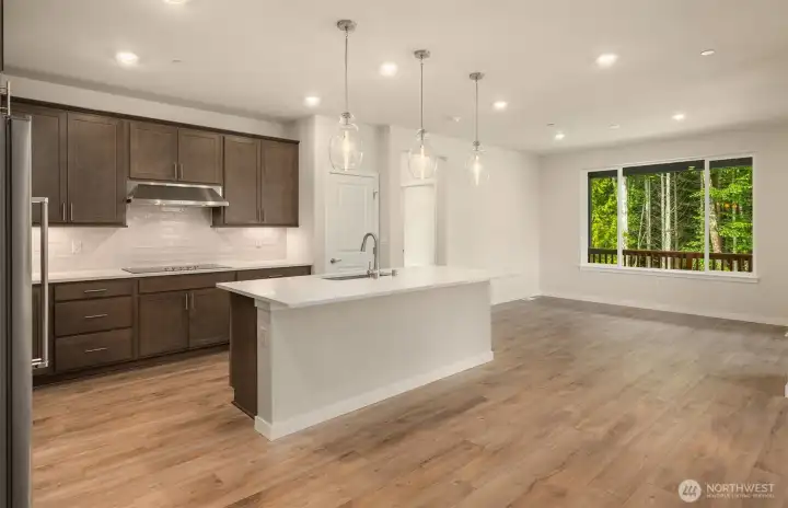 Photos of same design, but finishes and home views vary.