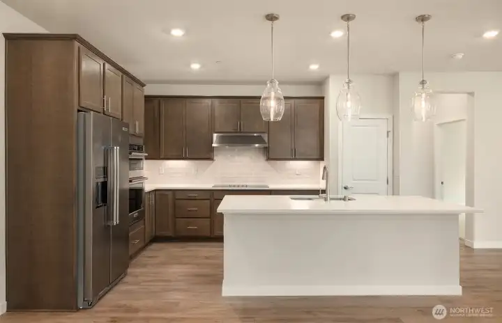 Photos of same design, but finishes and home views vary.