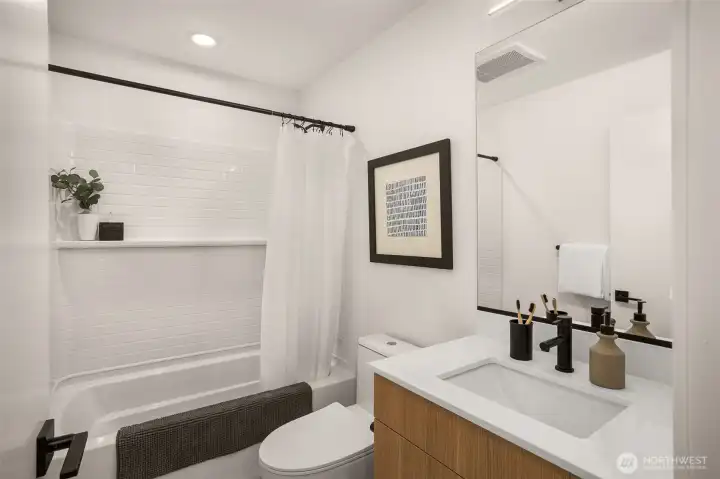 Secondary bathroom holds a tub giving all potential residents a access to a full bath