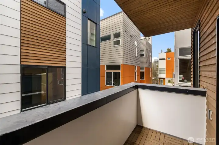 Balcony off the main living space is perfect for morning coffee or reading your favorite book