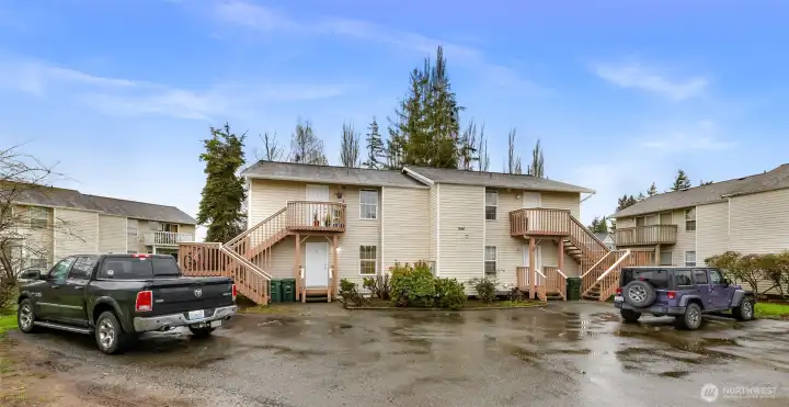 This well-located fourplex includes six dedicated parking spaces and sits just off Main Street, north of Grant’s Burgers — a strong rental corridor with consistent tenant demand.
