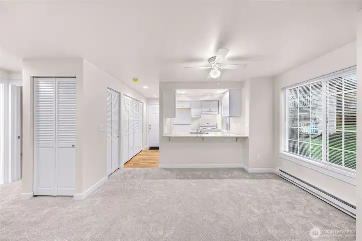 Unit #1 - From the living room, closet space to your left and plenty of closet storage down along the entry hallway
